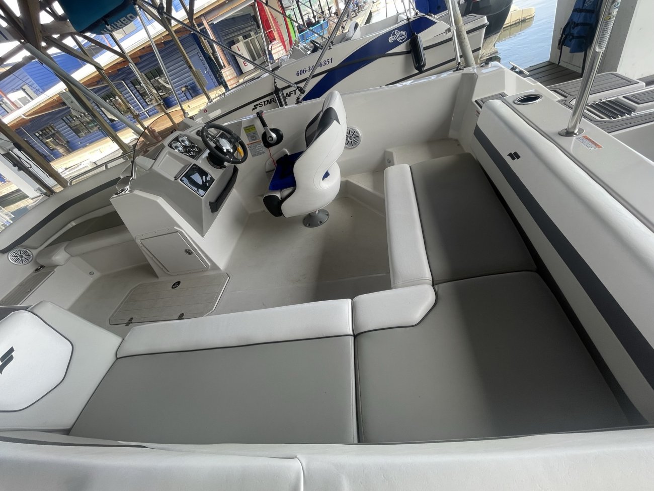 A  is a Power and could be classed as a Deck Boat,  or, just an overall Great Boat!