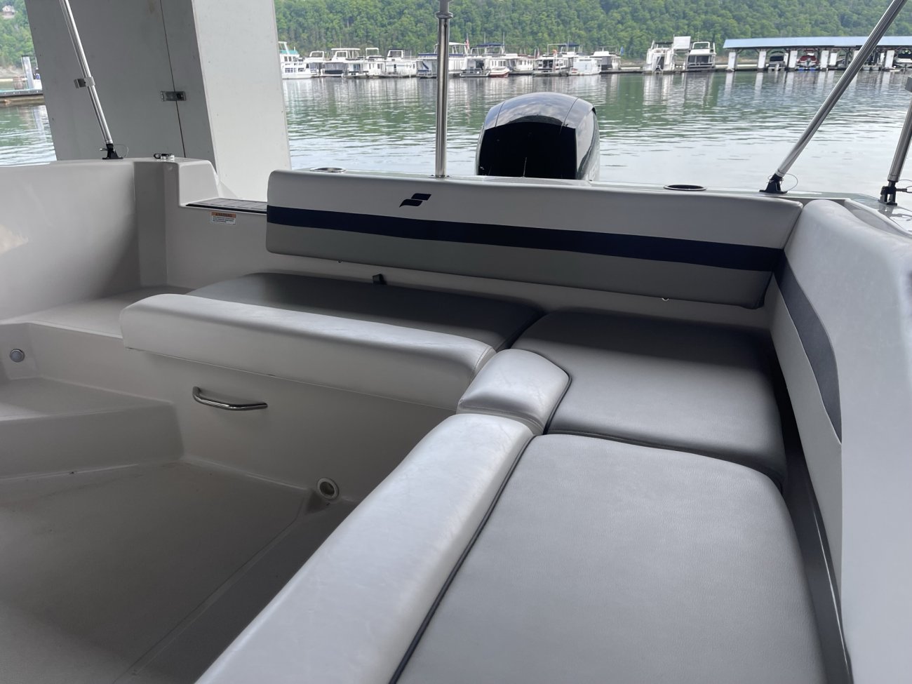 Glass fibers either loose or woven, reinforced with resin and used in the construction of many boats.