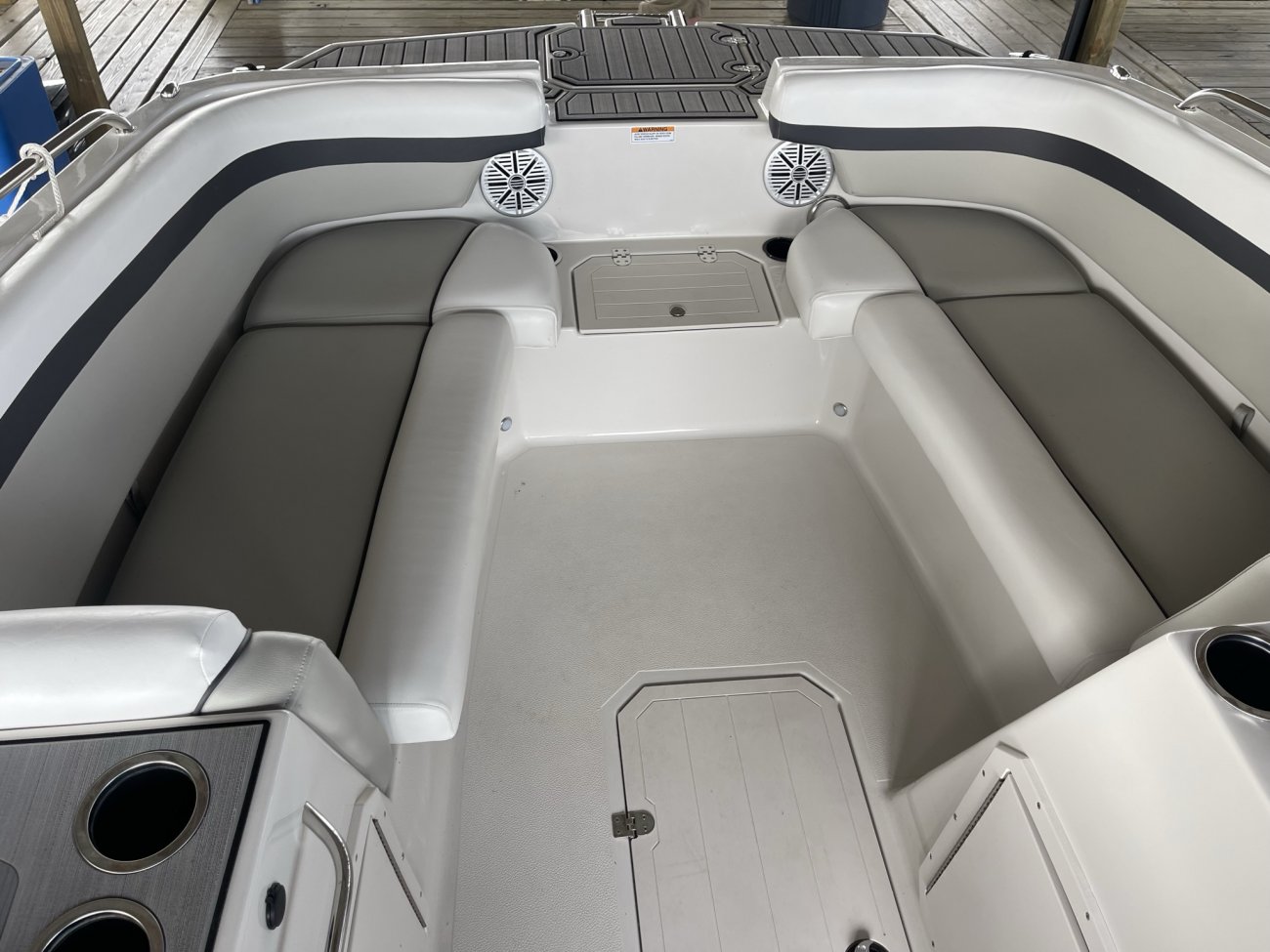 Glass fibers either loose or woven, reinforced with resin and used in the construction of many boats.