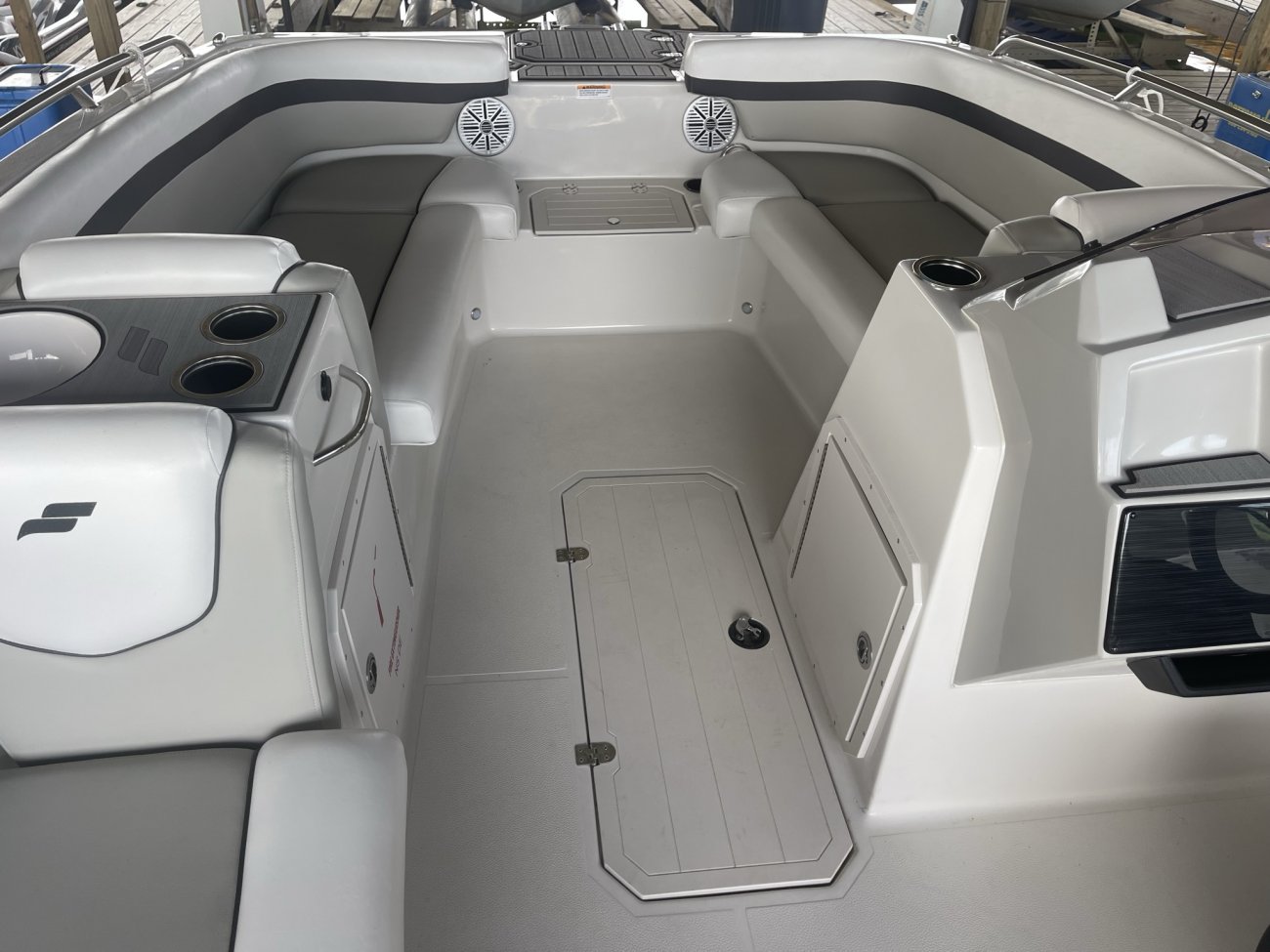 Glass fibers either loose or woven, reinforced with resin and used in the construction of many boats.