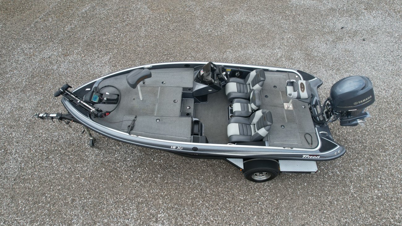 At Triton, we're proud of the way our boats look, but we believe it's what's inside that really counts. Triton boats feature the most advanced design, materials, construction methods and safety engineering in the entire fishing boat industry. As you'll see, we use aircraft technology in our hull construction - there's no wood in a Triton boat. Our innovative engineering approach enables every Triton hull to carry a lifetime warranty, plus a three-year warranty on most Triton-installed components. And, most important of all, every Triton boat is designed and built with your complete safety in mind.