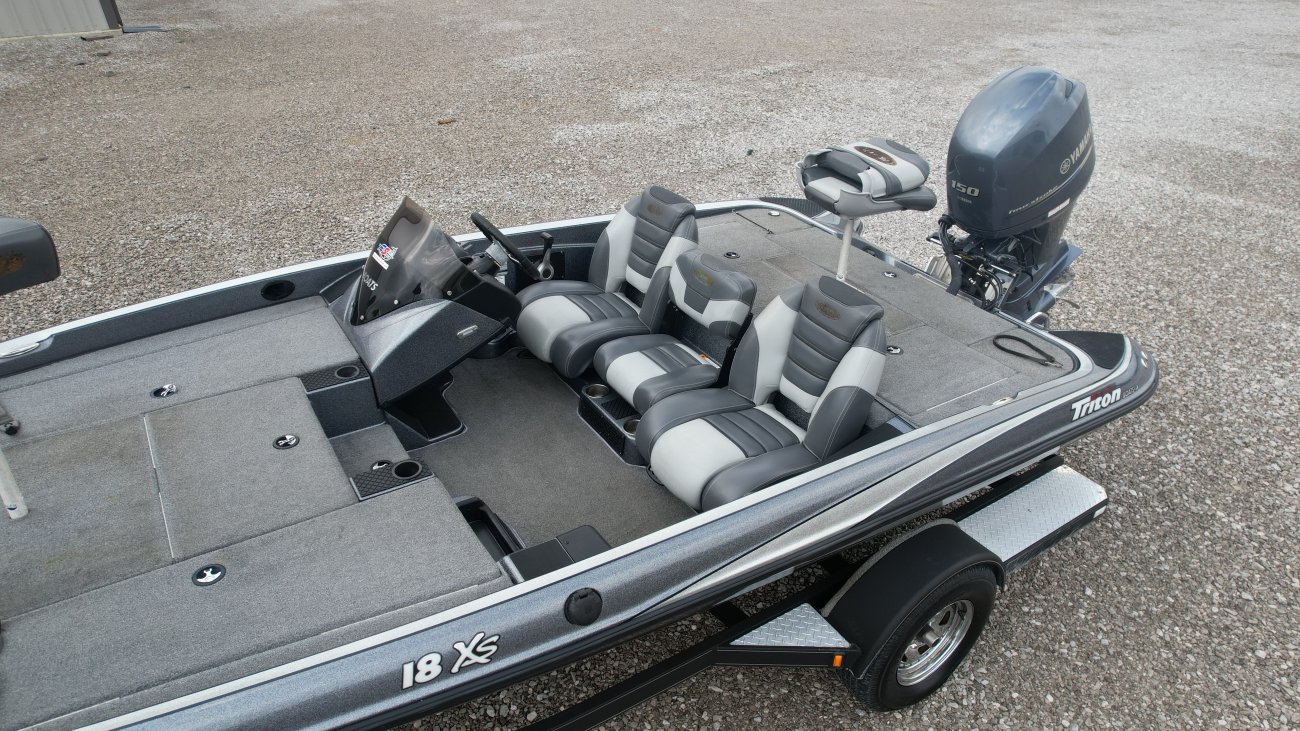 At Triton, we're proud of the way our boats look, but we believe it's what's inside that really counts. Triton boats feature the most advanced design, materials, construction methods and safety engineering in the entire fishing boat industry. As you'll see, we use aircraft technology in our hull construction - there's no wood in a Triton boat. Our innovative engineering approach enables every Triton hull to carry a lifetime warranty, plus a three-year warranty on most Triton-installed components. And, most important of all, every Triton boat is designed and built with your complete safety in mind.