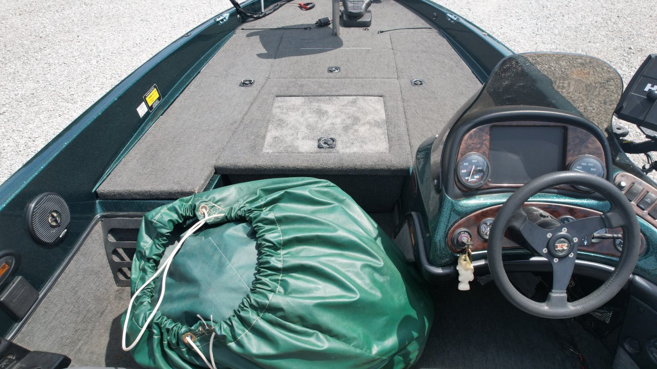 Glass fibers either loose or woven, reinforced with resin and used in the construction of many boats.