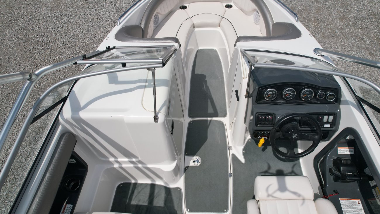 A bow rider is a boat with an open bow area where there are extra seats in front of the windshield.  Bow riders are typically between 17' and 30'long. They are well suited for many recreational water sports such as tubing, water skiing, and swimming.